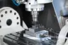 To measure cutting forces during milling with a stationary dynamometer, the dynamometer is mounted on the machine tool table.