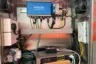 Weigh In Motion back panel: a look into the roadside cabinet with pre-wired WIM components and additional network gear.