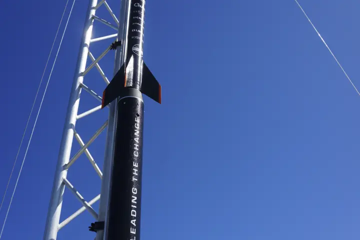 Origin, Faraday Rocketry's rocket Origin, Faraday Rocketry's rocket, standing in the launch rail just moments before the launch.