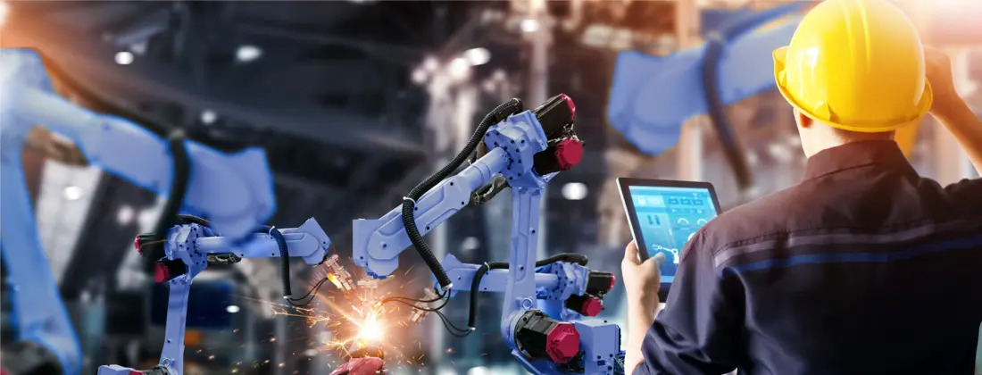 Welding robotics arms machine in intelligent factory with monitoring system software